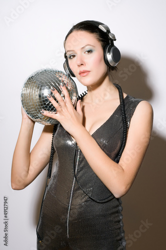 Photo: Portrait of nice young woman in headphones Portrait of nice young woman in headphones
