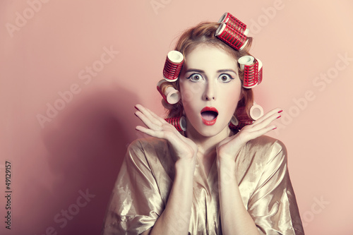 Photo: Surprised housewife with curlers Surprised housewife with curlers
