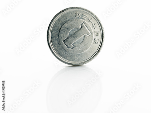 Photo: Japanese yen coin isolated on white background Japanese yen coin isolated on white background