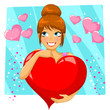 pretty girl holding a big heart