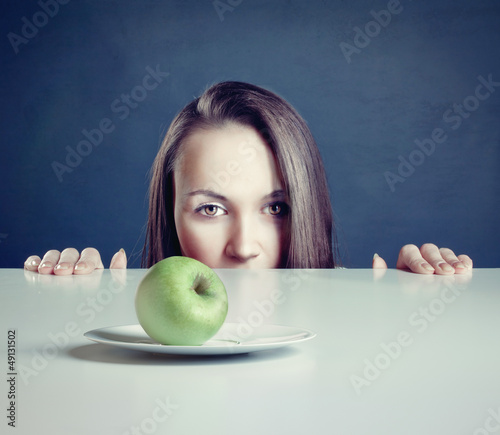 Photo: woman with apple woman with apple