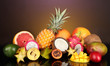 Composition of exotic fruits on colorful background