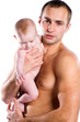 Photo: A man and a baby A man and a baby