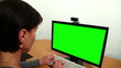 Video: Woman uses a computer. Over his shoulder. Woman uses a computer. Over his shoulder.