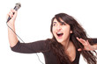 woman holding a microphone and singing loud