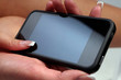 Woman hand holding smartphone
