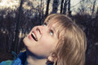 The girl it is surprised looks upwards