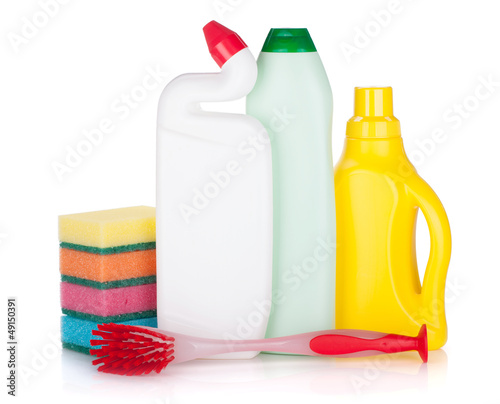 Photo: Plastic bottles of cleaning products, sponges and brush Plastic bottles of cleaning products, sponges and brush