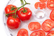 Fresh tomato on food dehydrator tray