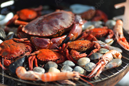 Photo: crabs shrimps on charcoal grill crabs shrimps on charcoal grill