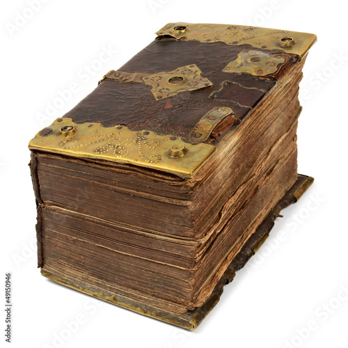 Photo: Very old book isolated on white Very old book isolated on white