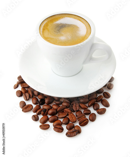 Photo: Coffee cup with beans isolated on white Coffee cup with beans isolated on white