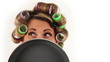 Funny Housewife with hair curlers shoots with eyes