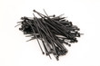 Photo: Black nylock cable ties on a white background. Black nylock cable ties on a white background.
