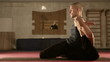 Young Yoga man doing Flexible Exercise in the Sport Gym