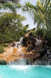Caribbean vacation resort with water slide and pool