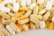 Composition with dietary supplement capsules. Drug pills