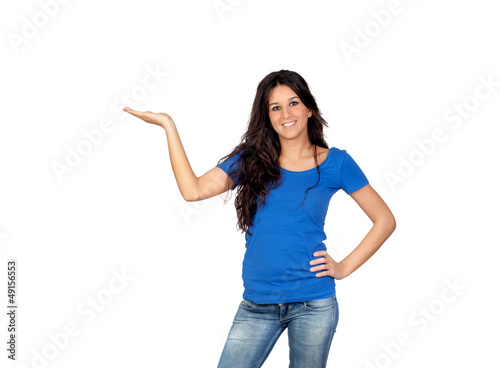 Photo: Beautiful brunette girl with a hand extended holding something Beautiful brunette girl with a hand extended holding something