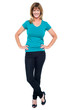 Stylish portrait of trendy casual woman, legs crossed