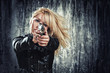 woman holding up her weapon