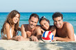 Happy Group Of Friends at Beach