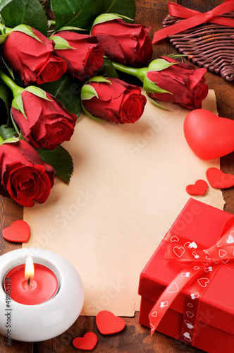 Photo: Valentine's frame with red roses and vintage paper Valentine's frame with red roses and vintage paper