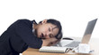 Photo: Tired business woman sleeping at her desk Tired business woman sleeping at her desk