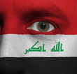 face with the Iraqi flag painted on it