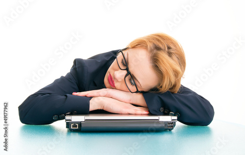 Photo: Tired or sleepy business woman Tired or sleepy business woman