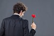 Man giving fabric rose
