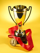golden cup and medal