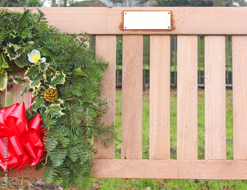 Photo: Memorial bench with wreath and name plaque Memorial bench with wreath and name plaque