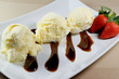 Ice Cream with Chocolate Sauce and Fresh Strawberries