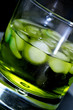 glass with a yellow cocktail