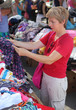 Mid adult woman shopping in textile store, real people
