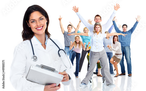 Photo: Family doctor woman and a group of happy people. Family doctor woman and a group of happy people.
