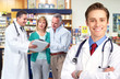 Pharmacist with a senior couple.