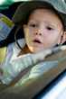 Photo: Adorable little boy in a car Adorable little boy in a car