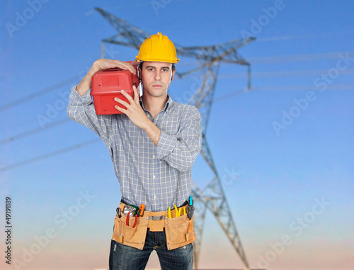 Photo: Electrician with his tool box Electrician with his tool box