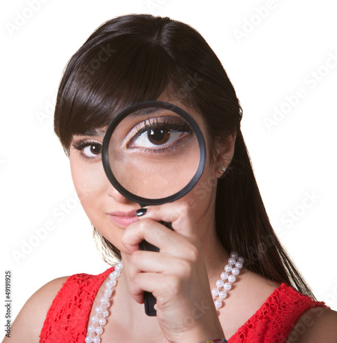 Photo: Woman with Magnifying Glass Woman with Magnifying Glass