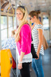 Pretty, young woman on a streetcar/tramway