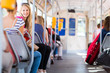 Pretty, young woman on a streetcar/tramway Pretty, young woman on a streetcar/tramway