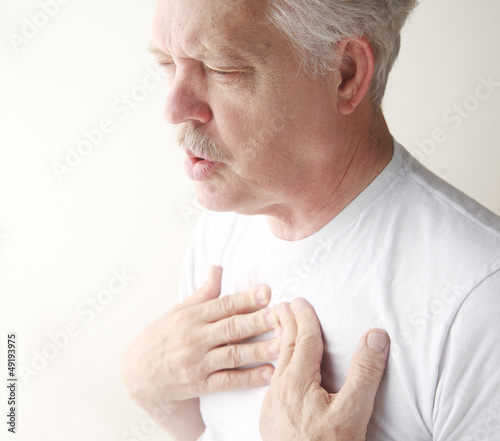 Photo: senior has trouble breathing with chest pain senior has trouble breathing with chest pain