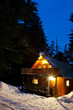 Cabin In Woods At Dusk