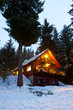 Cabin In Woods At Dusk