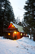 Cabin In Woods At Dusk