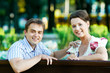 Smiling young couple at spring outdoors