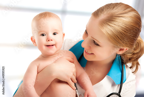 Photo: Pediatrician doctor and patient - small child Pediatrician doctor and patient - small child