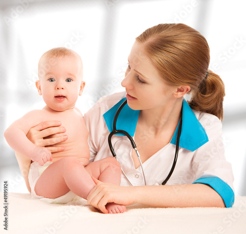 Photo: Pediatrician doctor and patient - small child Pediatrician doctor and patient - small child