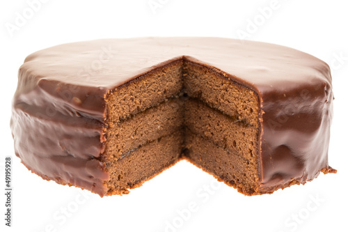 Photo: Angeschnittene Sachertorte auf weißem Hintergrund Angeschnittene Sachertorte auf weißem Hintergrund